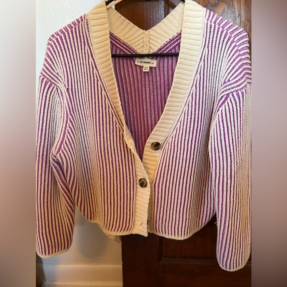 Contrast stitch sweater.
